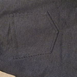 Pull on pants. Dark blue with a light blue/gray pinstripe. Size XL